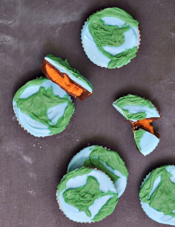 peanut butter cups decorated as blue and green earths for Earth Day