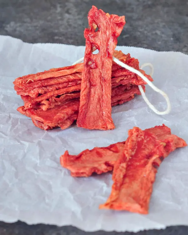 watermelon candy strips on parchment