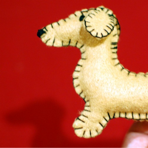 A felt dachshund ornament.