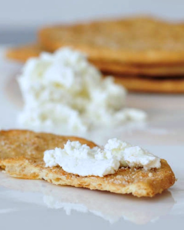 Vegan Goat Cheese spread on a cracker