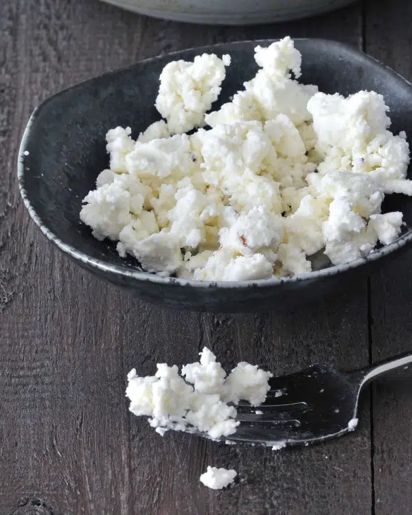 Vegan Goat Cheese crumbled in a bowl