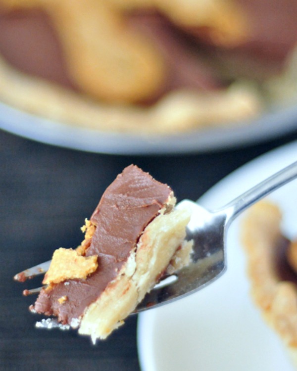 single bite of Chocolate Peanut Butter Truffle Pie on a fork