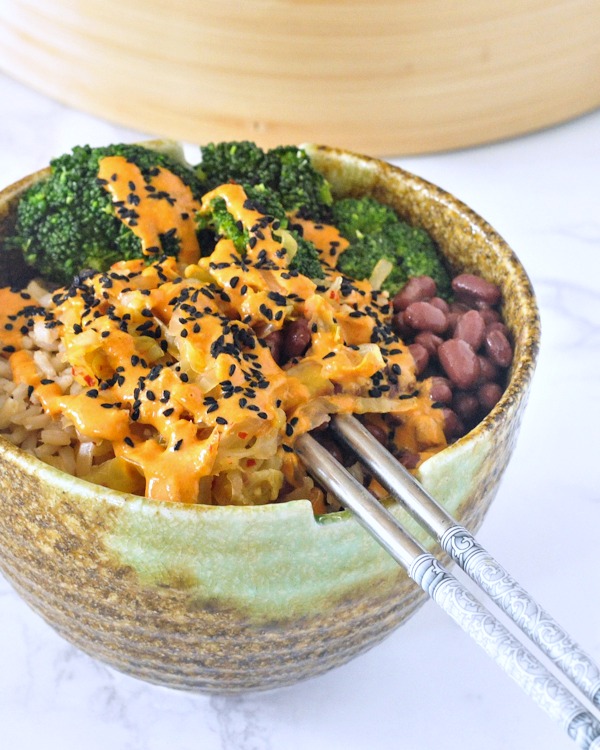 single Kimchi Bowl with Red Curry Almond Sauce with chopsticks