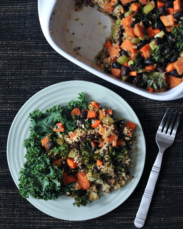 Roasted Veggie Quinoa Casserole on a plate, whole casserole in baking dish on the side