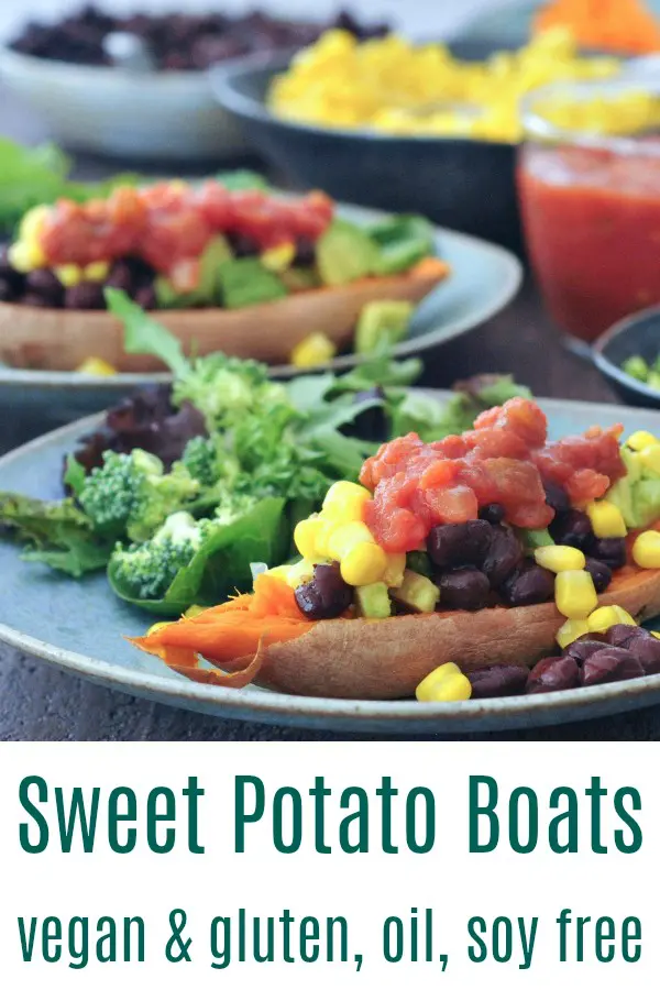 Savory sweet potato boats on plates: black bean, corn, and salsa fillings in bowls in background