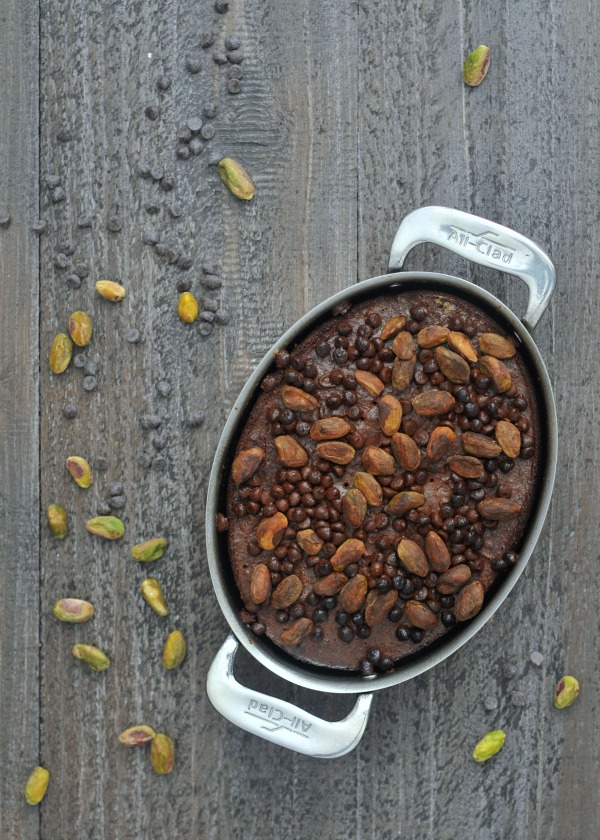 pan of small batch air fryer brownies, pistachios and chocolate chips scattered around