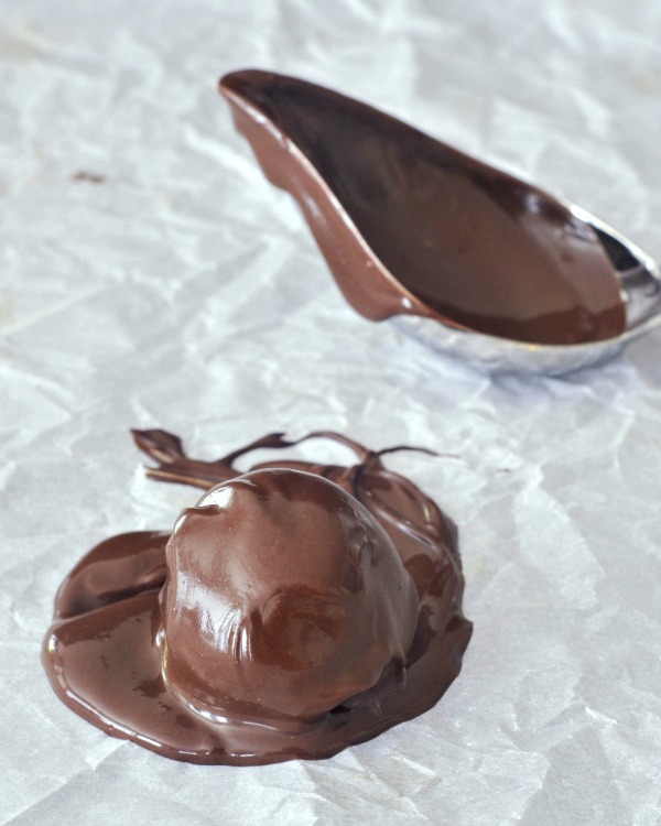 Oreo Cashew Truffle covered in freshly melted chocolate