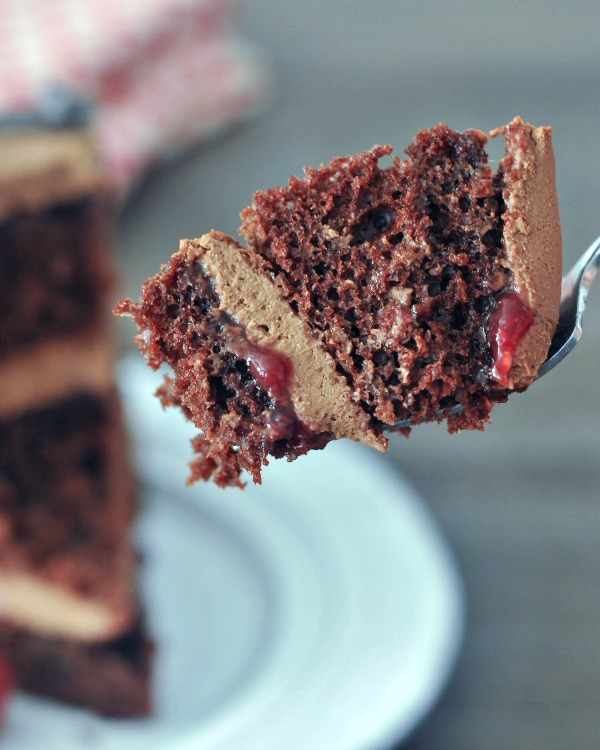 bite of Delectably Rich Vegan Chocolate Mousse Cake on a fork