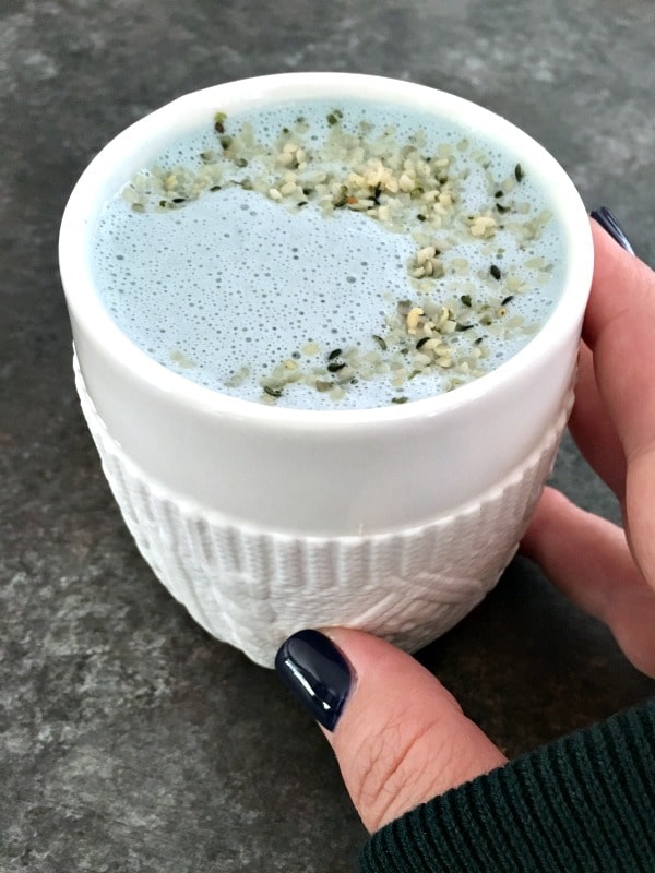 pale blue vanilla mint cashew milk in a white mug
