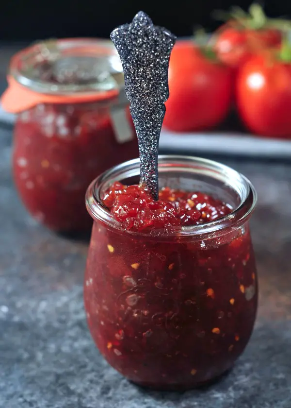 two jars of refrigerator jam, one with a spoon sticking out