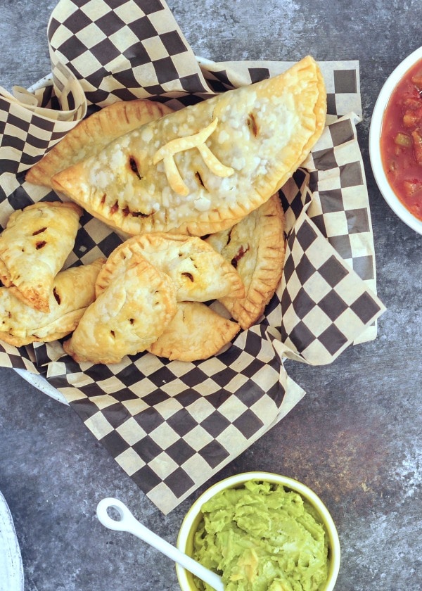 Vegan Taco Hand Pies in a checkered paper lined basket