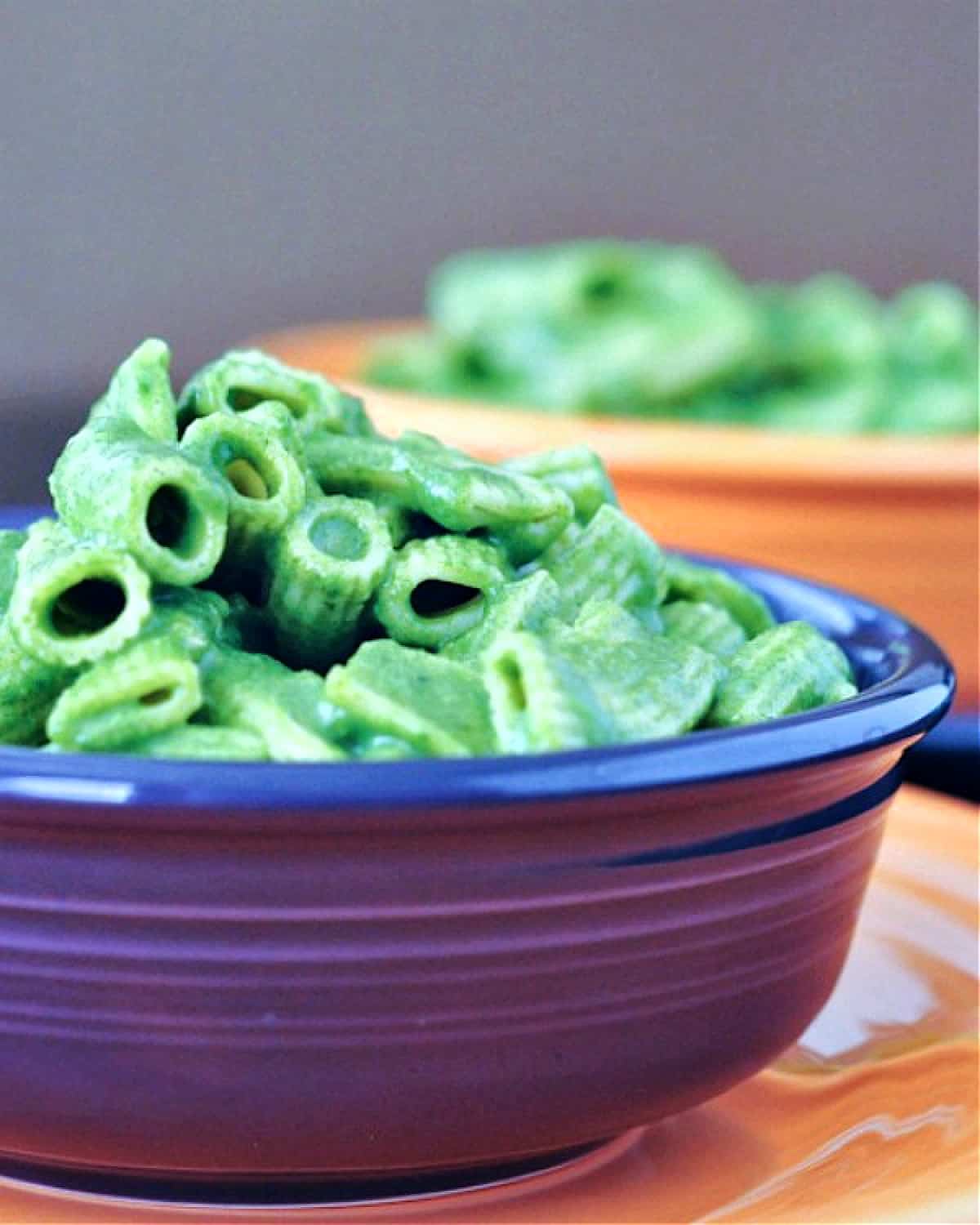 a bowl of green mac and cheese (made by adding spinach to cheese sauce)