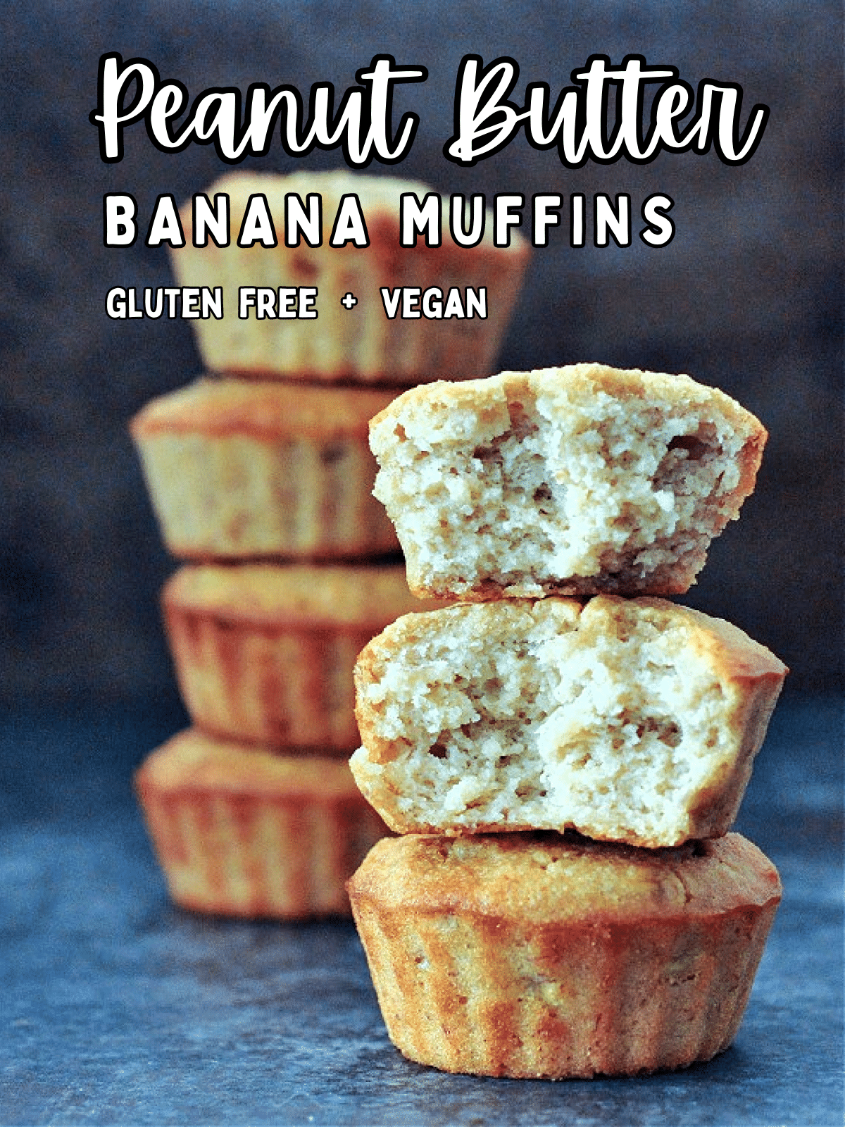 Two stacks of peanut butter banana muffins, with the front stack in focus and one muffin cut in half to show crumb inside.