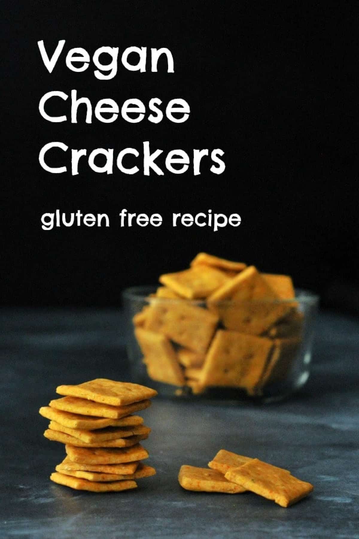 A stack and a bowl of gluten free cheese crackers.