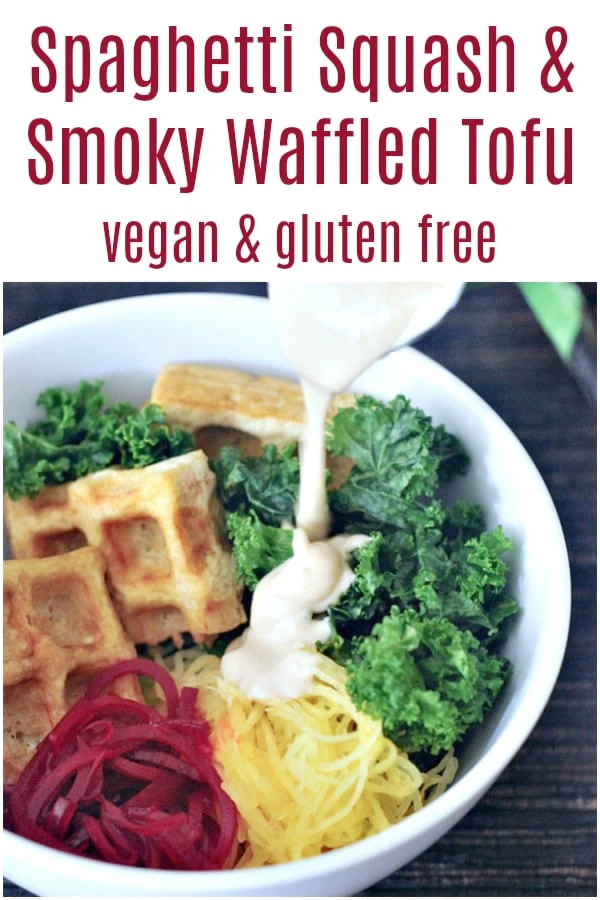 Veggie bowl with waffled tofu (spaghetti squash, roasted beet ribbons, marinated kale, and tofu cooked in the waffle maker) with a tahini sauce drizzled over top.