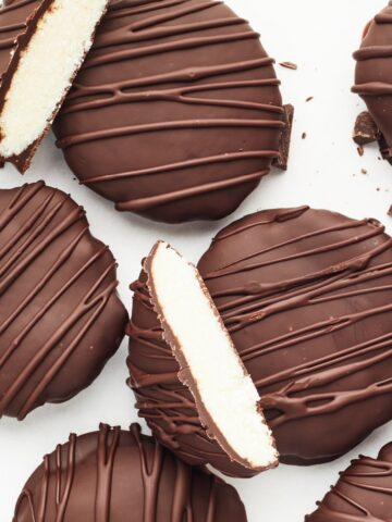 Overhead view dairy free peppermint patties on a white background.