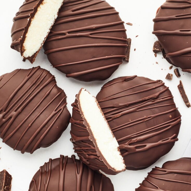 Overhead view dairy free peppermint patties on a white background.